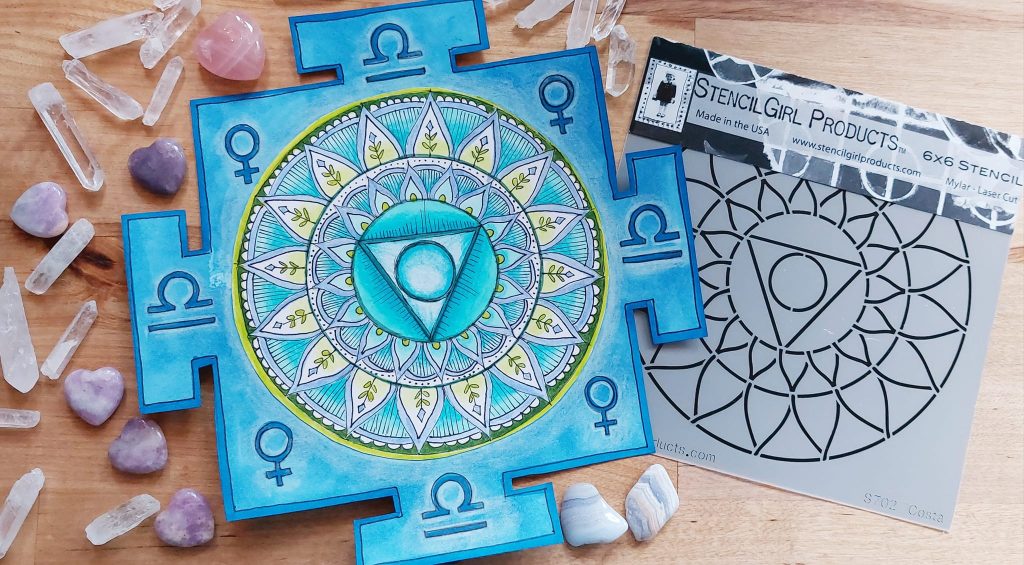 Mandala art with libra and venus symbols and throat chakra.