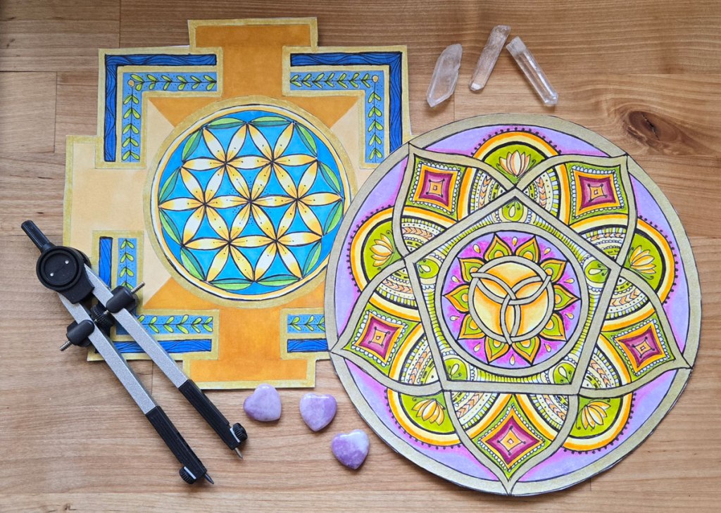 two mandalas, flower of life pattern, compass, gemstones